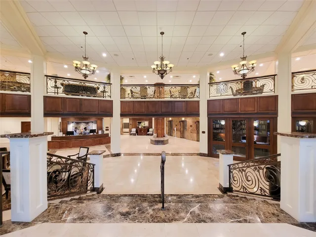 a view of a living room and kitchen