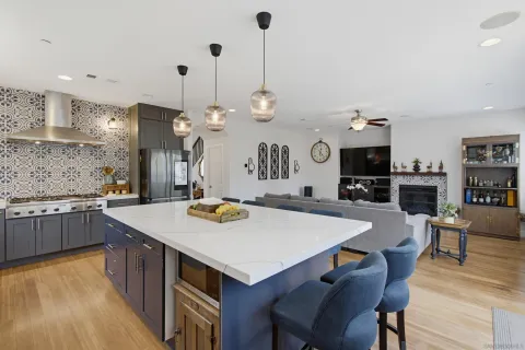 a kitchen with a stove and cabinets