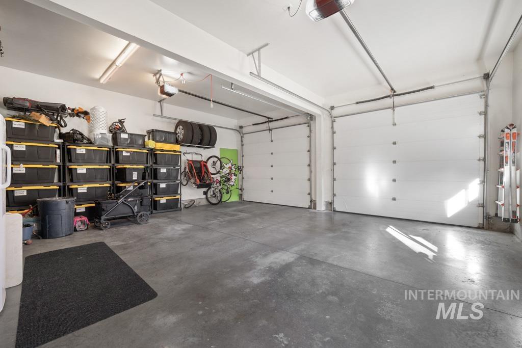 417 East E Street Moscow, ID 83843 - Photo 14 of 29 Garage featuring a garage door opener