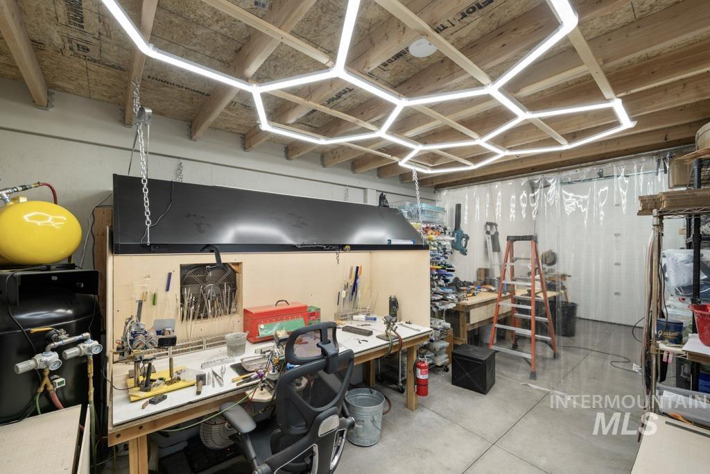 417 East E Street Moscow, ID 83843 - Photo 29 of 29 Miscellaneous room featuring concrete flooring and a workshop area