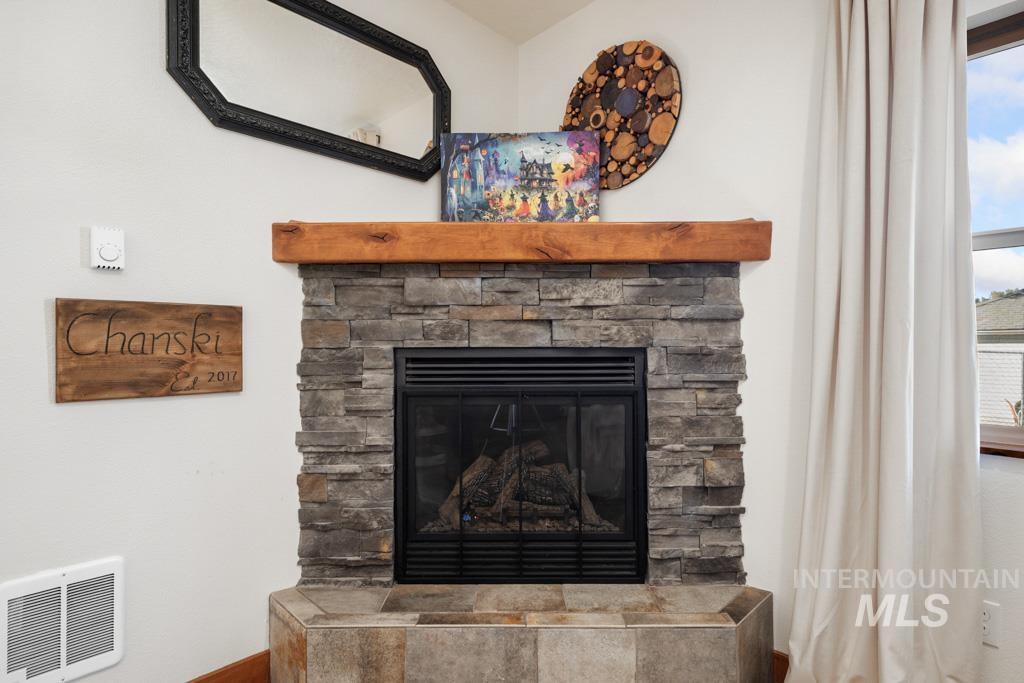 417 East E Street Moscow, ID 83843 - Photo 7 of 29 Detailed view of a fireplace and baseboards