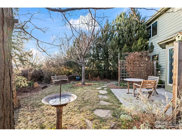 a front view of house with outdoor seating
