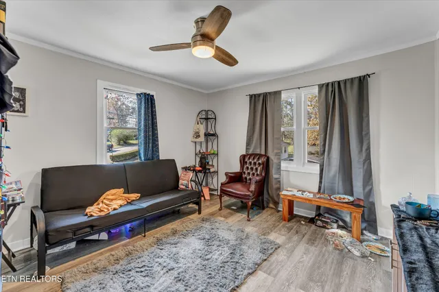 a living room with furniture and a window