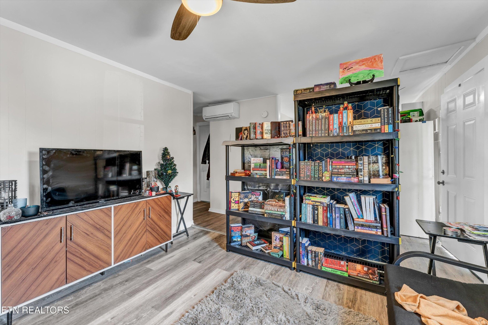 558560 West Outer Drive Oak Ridge, TN 37830 - Photo 6 of 29 a living room with fireplace furniture and a flat screen tv