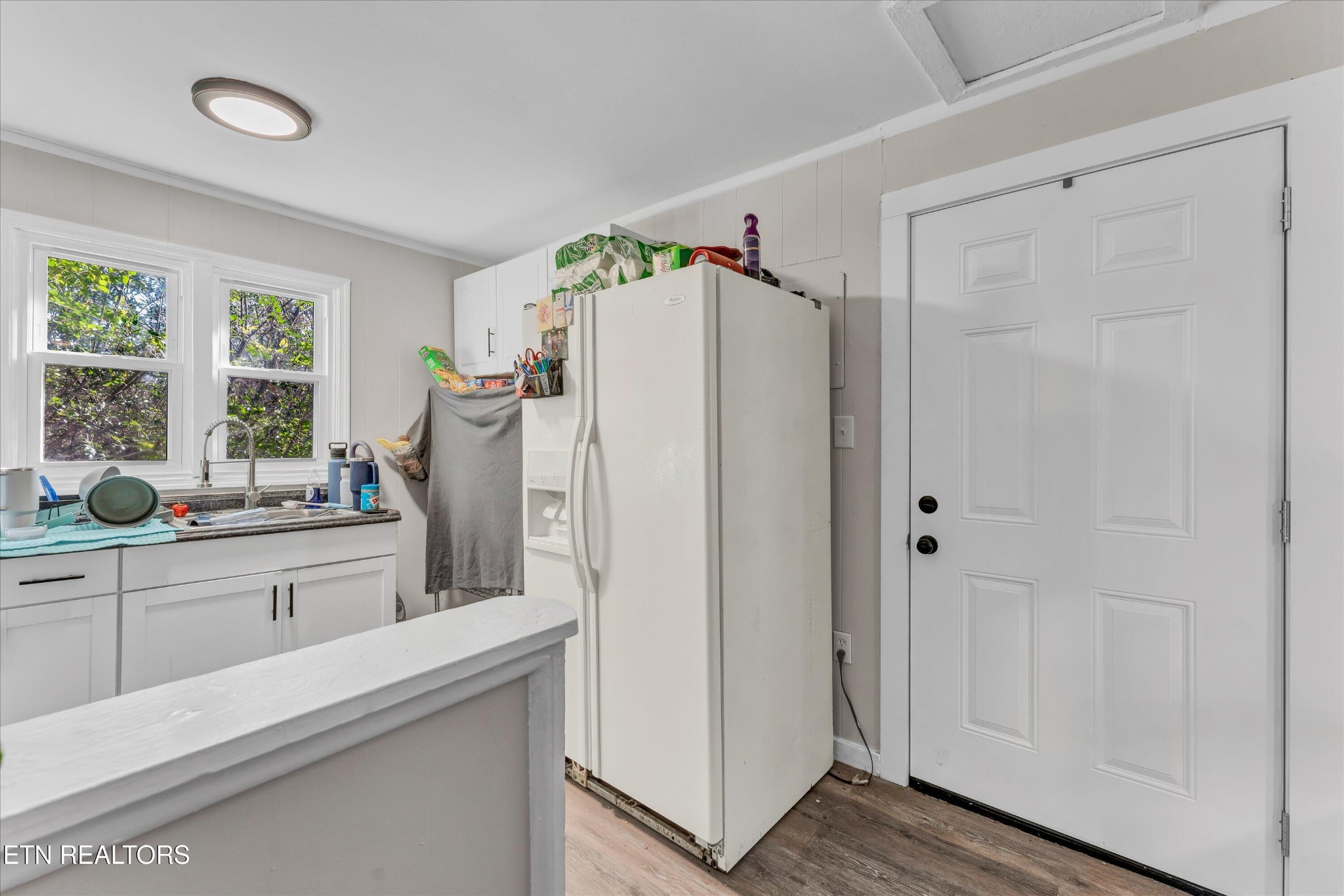 558560 West Outer Drive Oak Ridge, TN 37830 - Photo 9 of 29 a white refrigerator freezer sitting inside of a kitchen