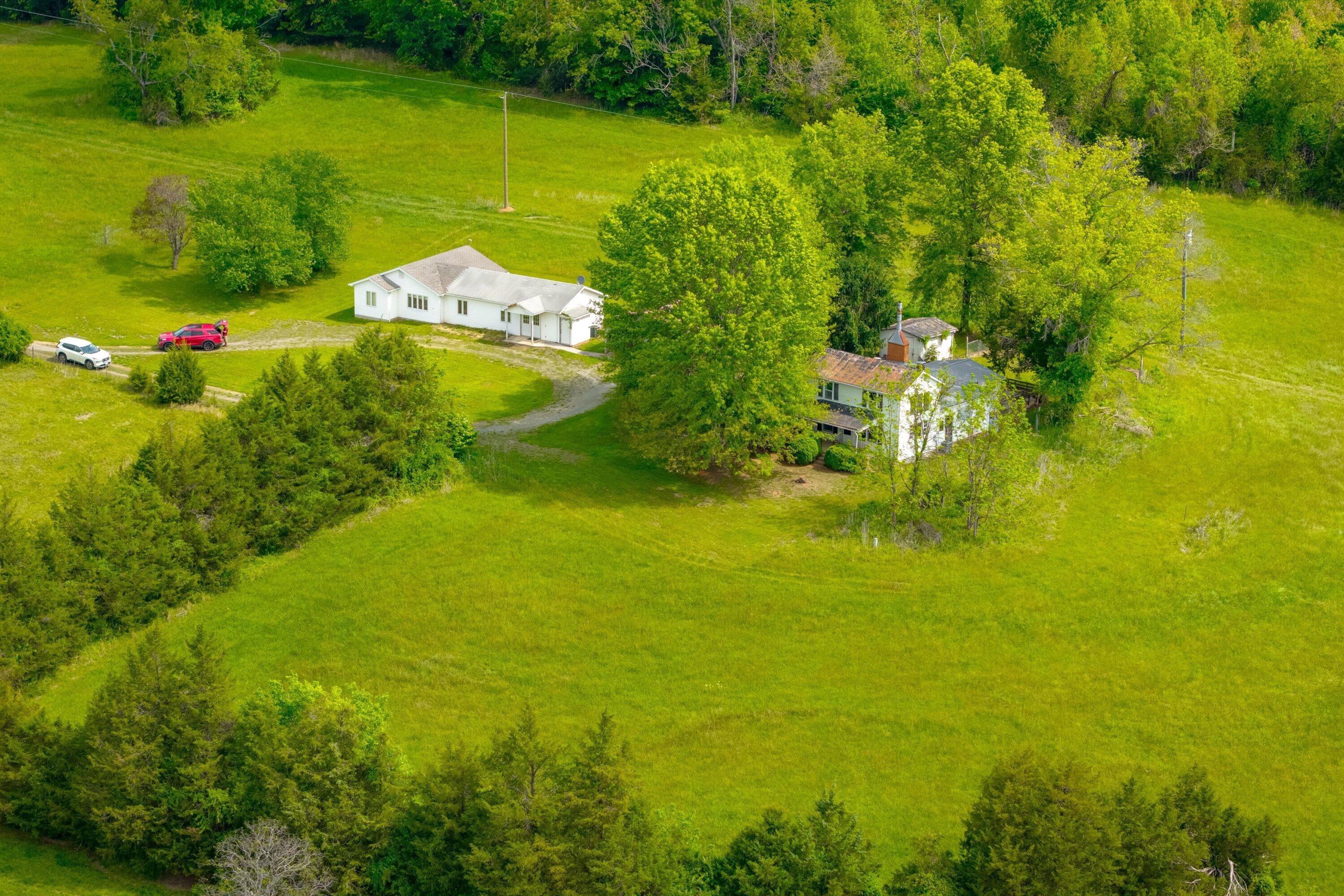 5328 White House Road Moneta, VA 24121 - Photo 3 of 39 a view of a lake with a house