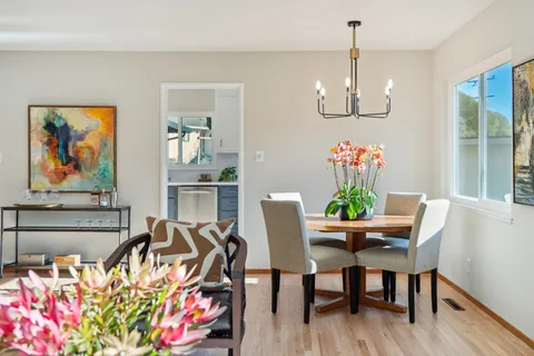 a bedroom with a bed and a table in it