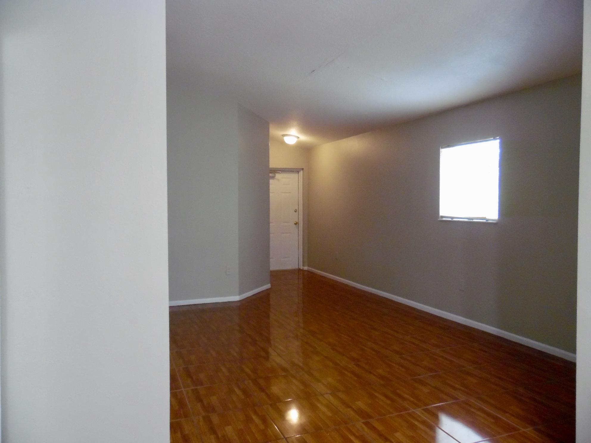 3740 North Jog Road, Unit 201 West Palm Beach, FL 33411 - Photo 3 of 11 fullsizeoutput_55f