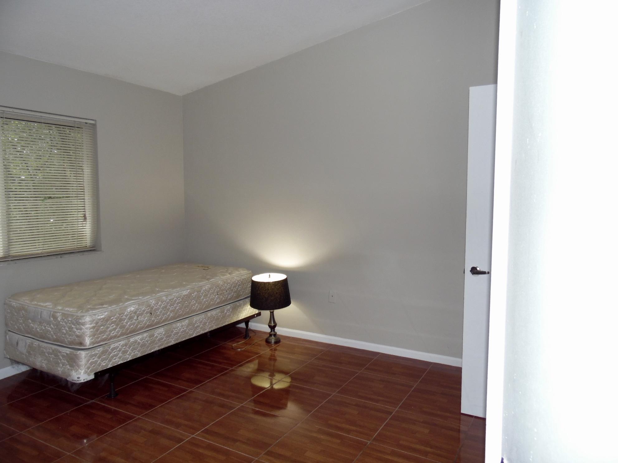 3740 North Jog Road, Unit 201 West Palm Beach, FL 33411 - Photo 5 of 11 fullsizeoutput_563