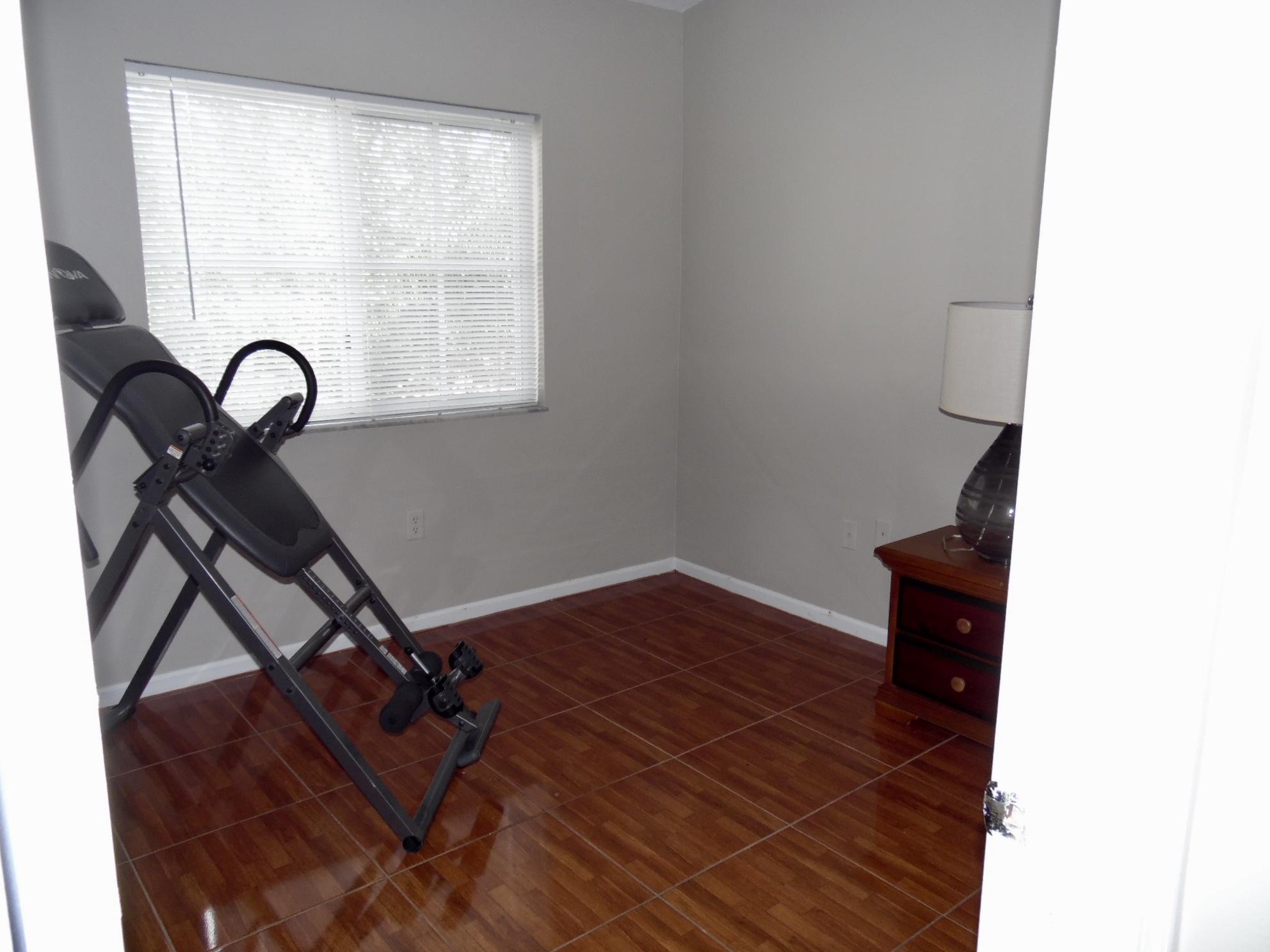 3740 North Jog Road, Unit 201 West Palm Beach, FL 33411 - Photo 9 of 11 fullsizeoutput_568