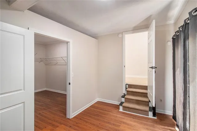a view of front door with wooden floor
