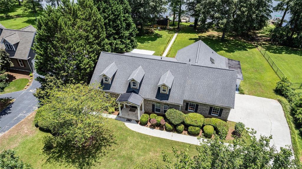 96 Pointe View Court Jackson, GA 30233 - Photo 33 of 36 an aerial view of a house with a yard and potted plants