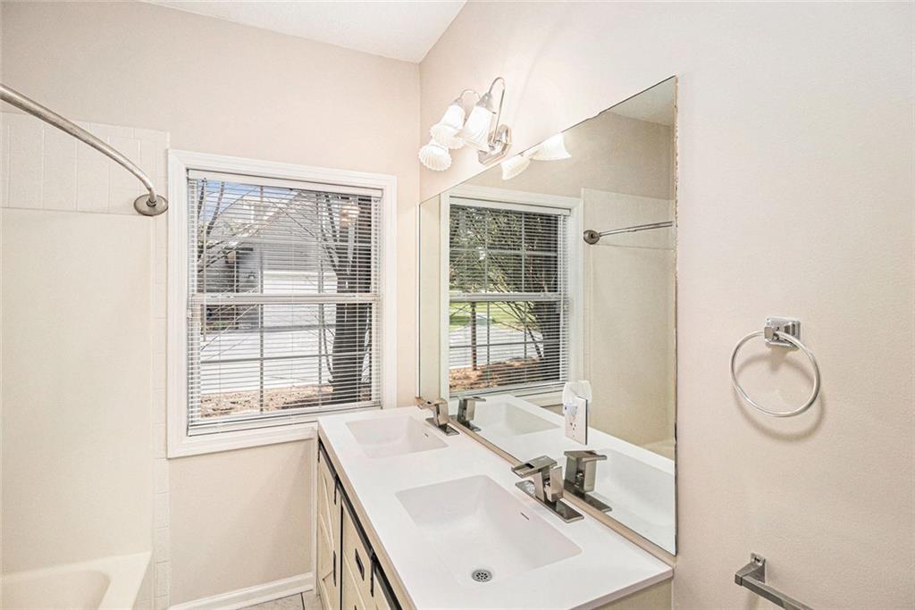 96 Pointe View Court Jackson, GA 30233 - Photo 10 of 36 a bathroom with a sink vanity and tub