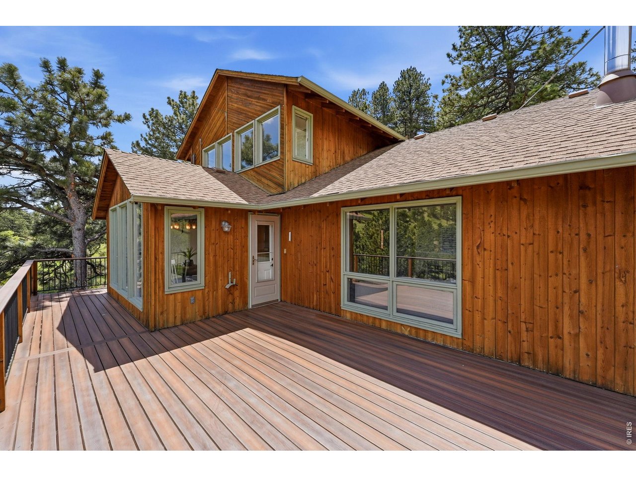 607 North Cedar Brook Road Boulder, CO 80304 - Photo 15 of 36 Dine outdoors directly from the kitchen. 1377/sf of Fibron composite decking on two levels