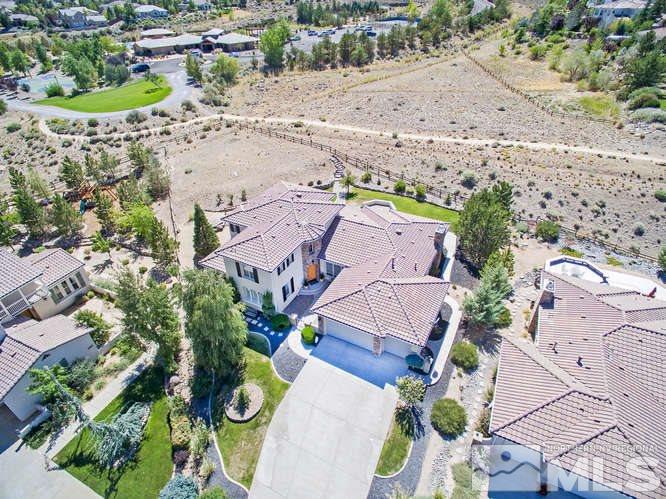 2977 Roundrock Court Reno, NV 89511 - Photo 1 of 1 an aerial view of house with a swimming pool