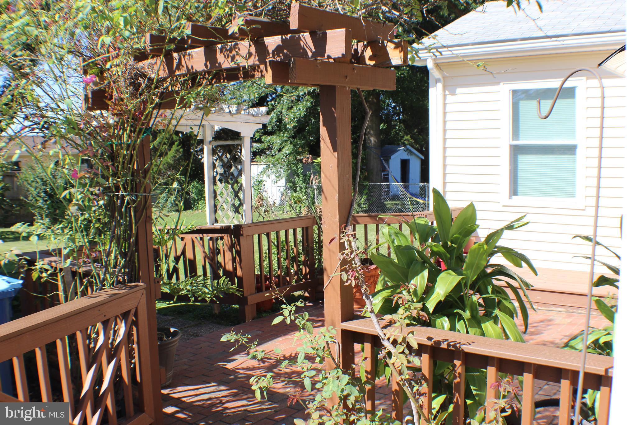 111 North Hickory Road Sterling, VA 20164 - Photo 13 of 30 a view of a house with backyard and sitting area