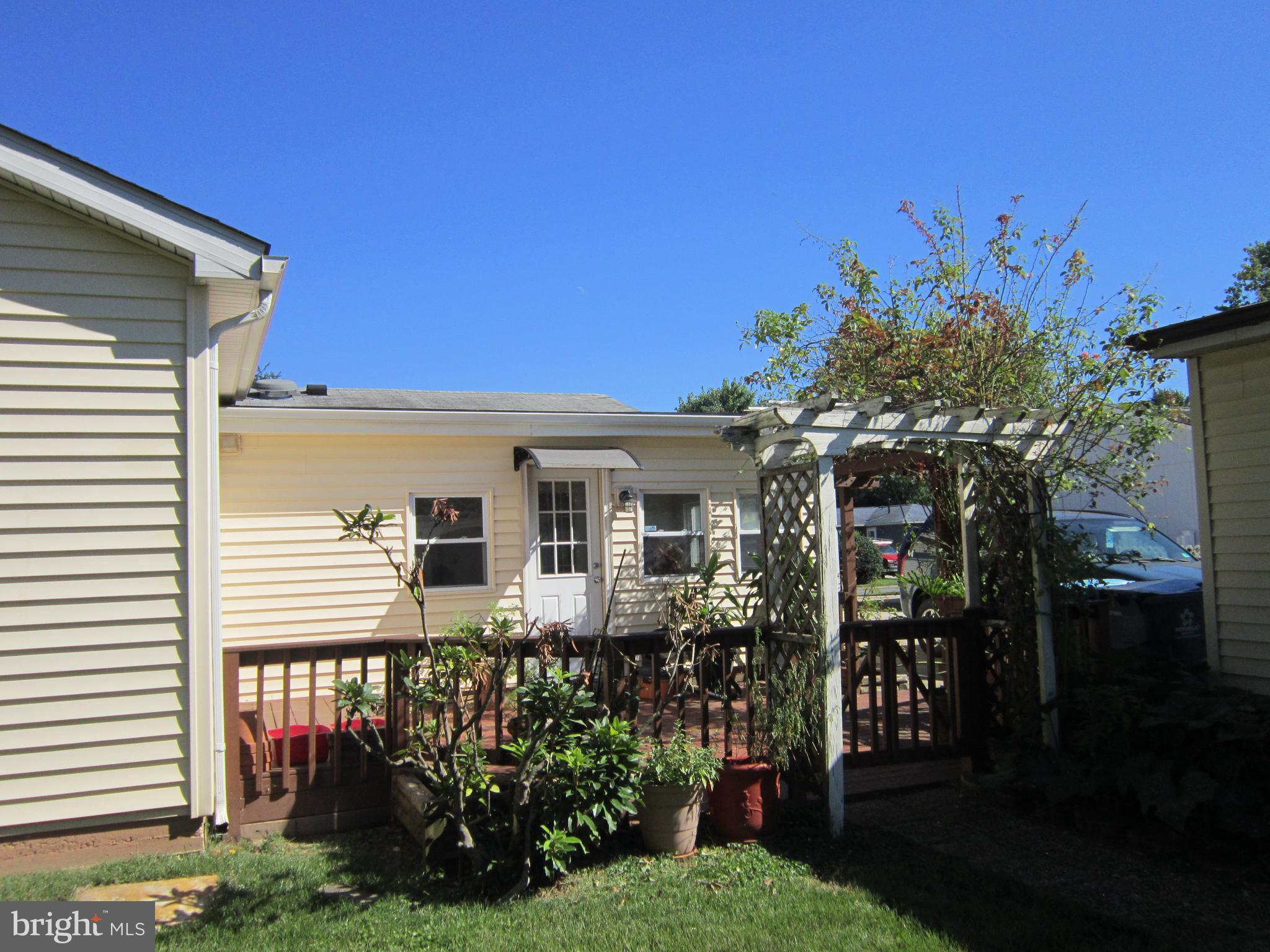 111 North Hickory Road Sterling, VA 20164 - Photo 15 of 30 a front view of a house with garden
