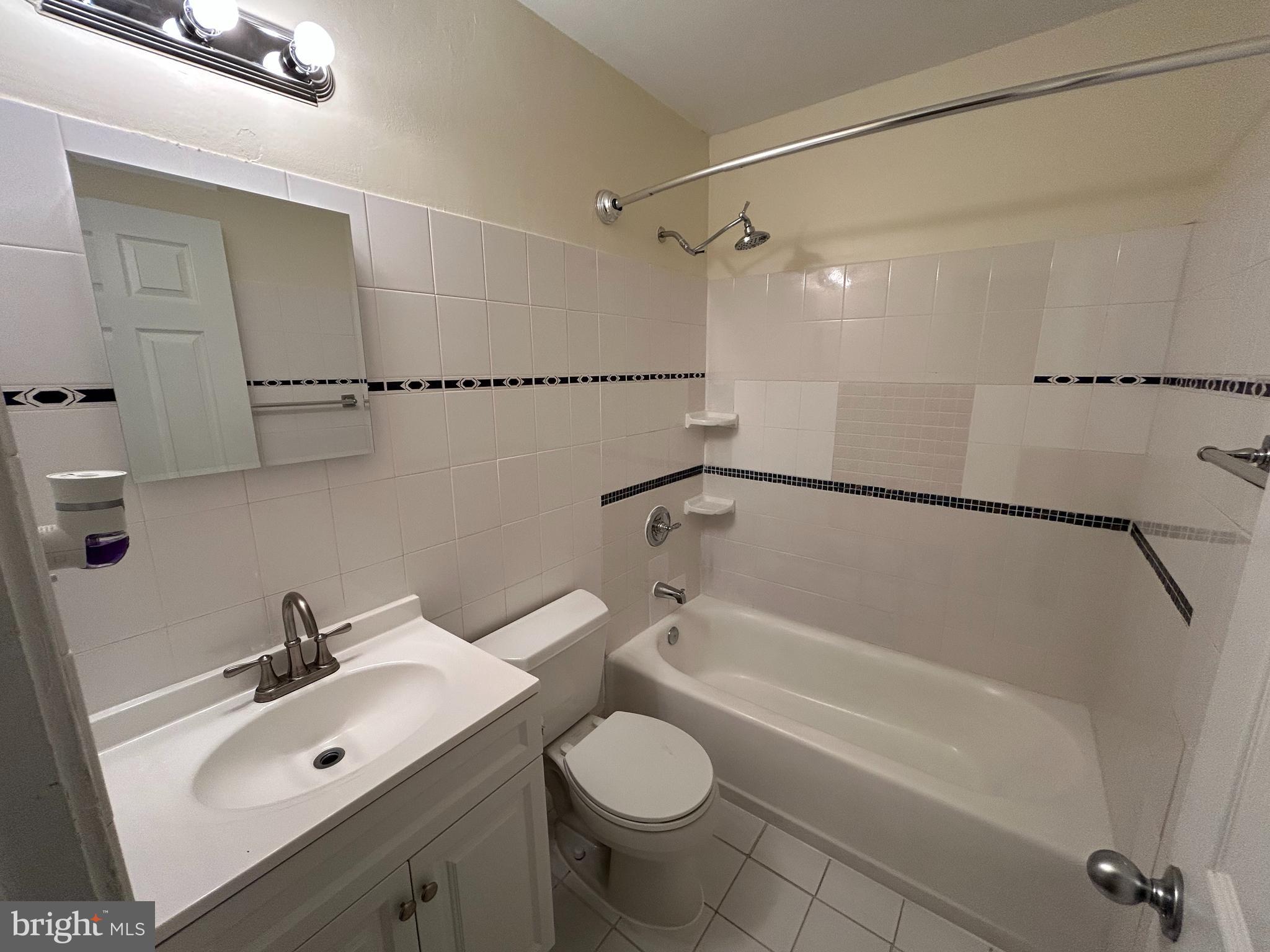 111 North Hickory Road Sterling, VA 20164 - Photo 20 of 30 a bathroom with a sink toilet and shower