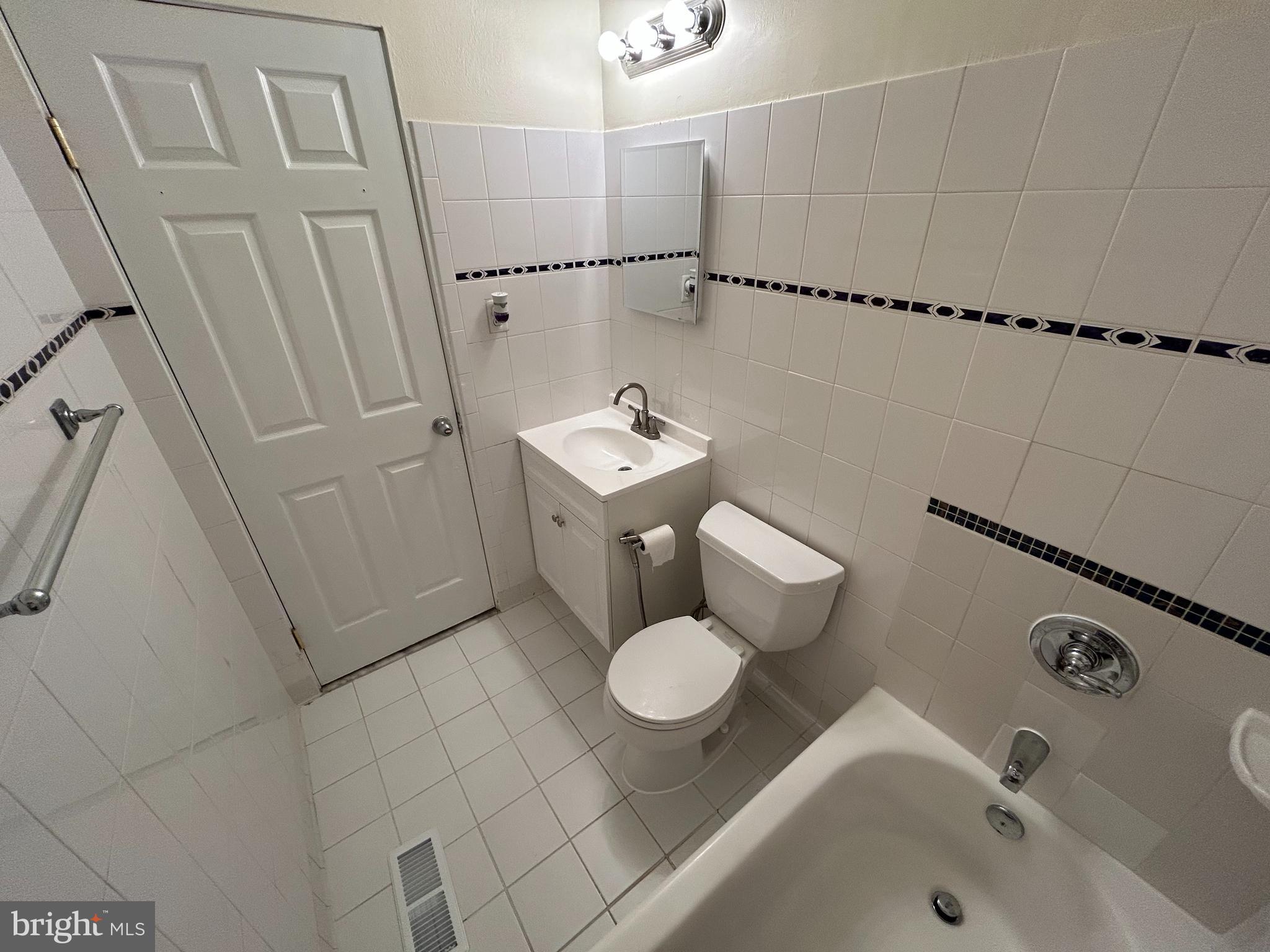 111 North Hickory Road Sterling, VA 20164 - Photo 21 of 30 a bathroom with a sink toilet and shower