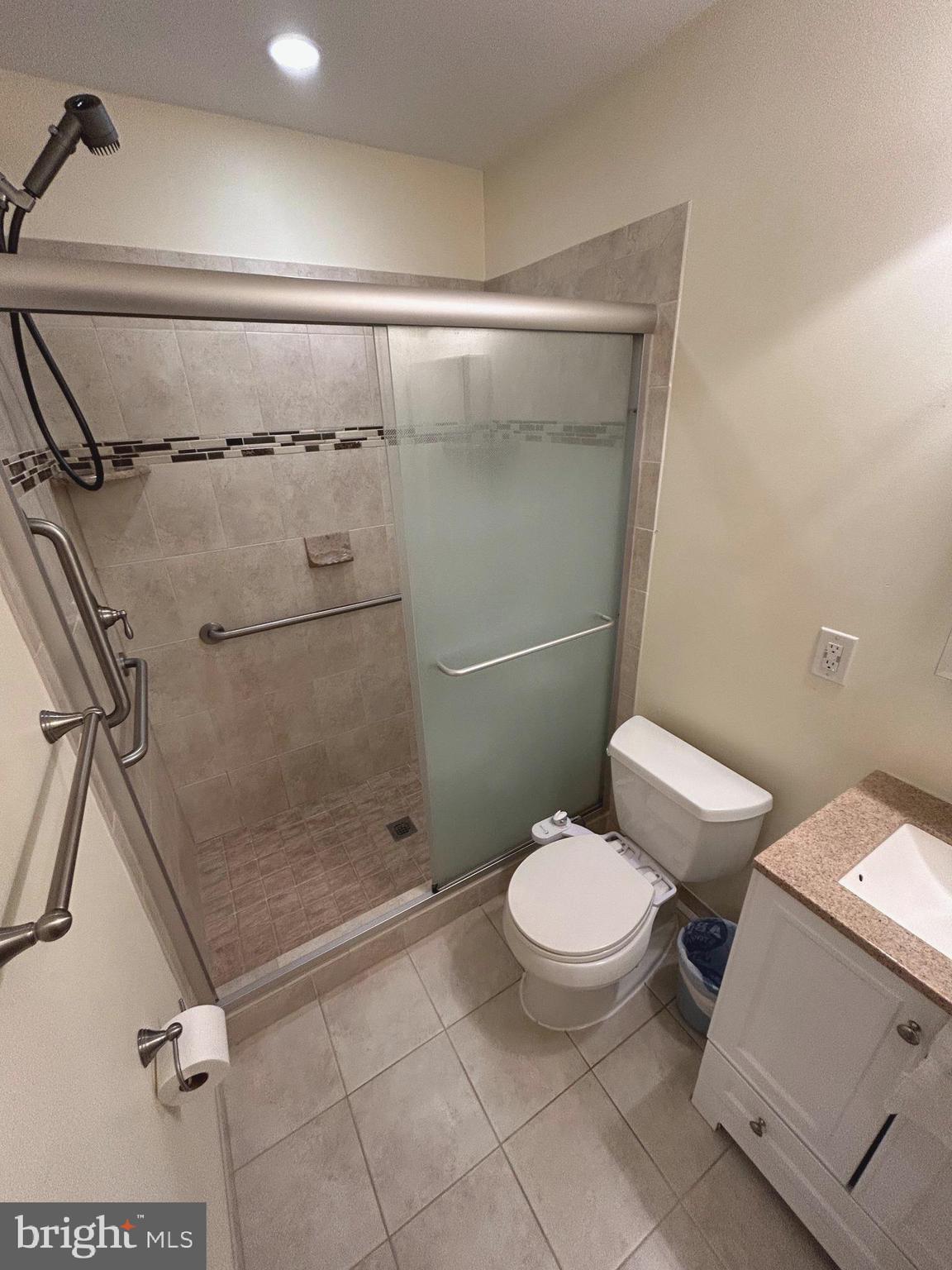 111 North Hickory Road Sterling, VA 20164 - Photo 24 of 30 a bathroom with a toilet and a shower