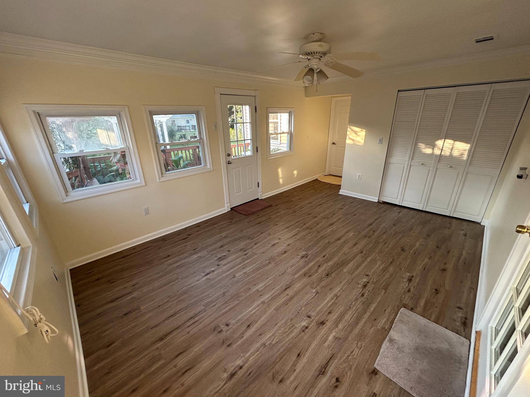 111 North Hickory Road Sterling, VA 20164 - Photo 28 of 30 a view of an empty room with a window and wooden floor