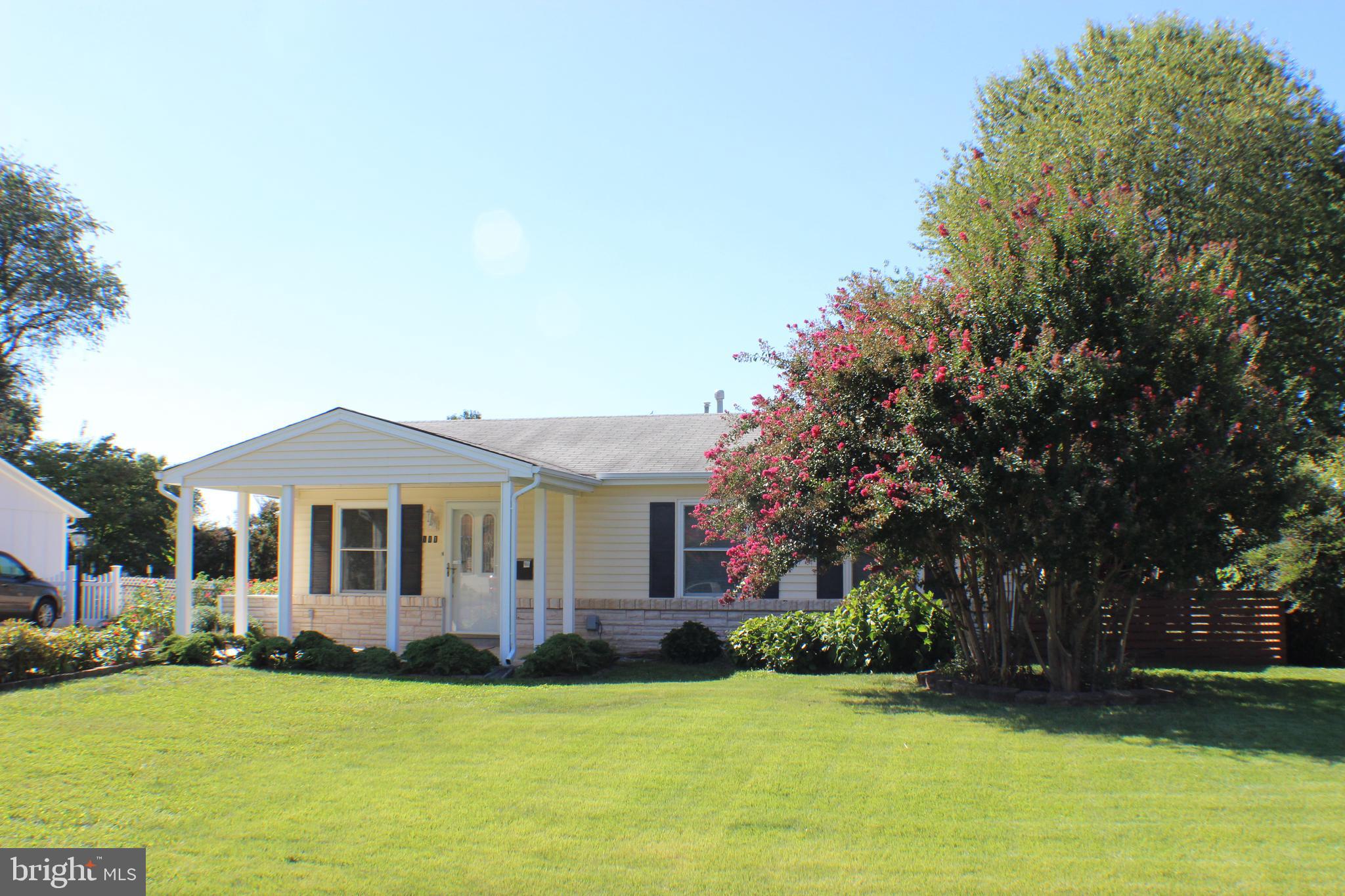 111 North Hickory Road Sterling, VA 20164 - Photo 3 of 30 a front view of a house with a garden