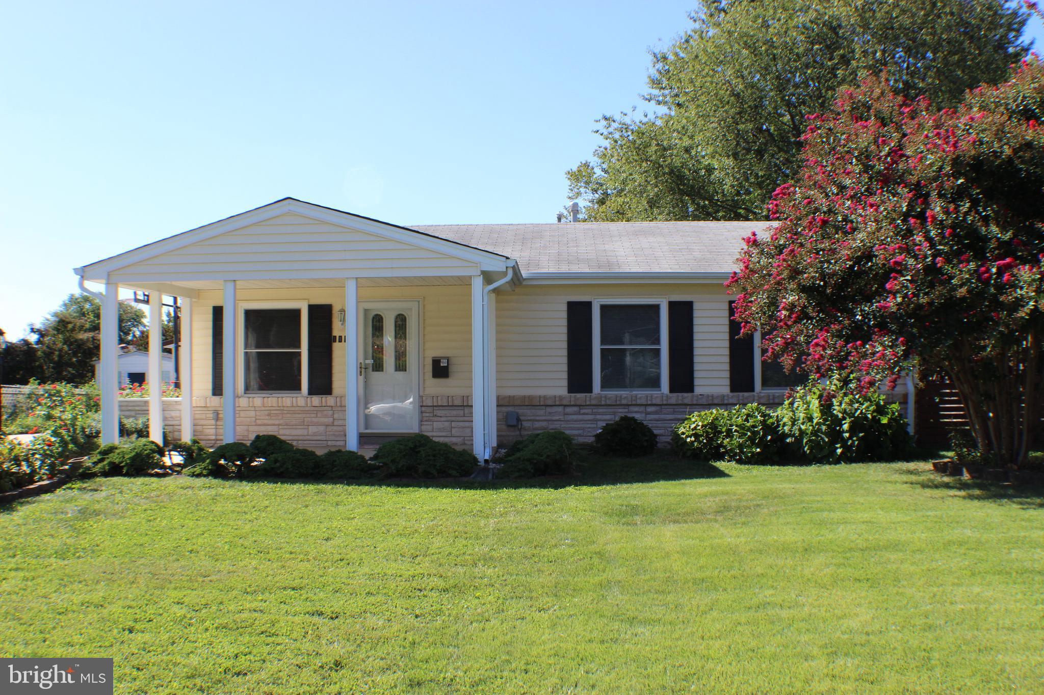 111 North Hickory Road Sterling, VA 20164 - Photo 4 of 30 a front view of a house with a yard