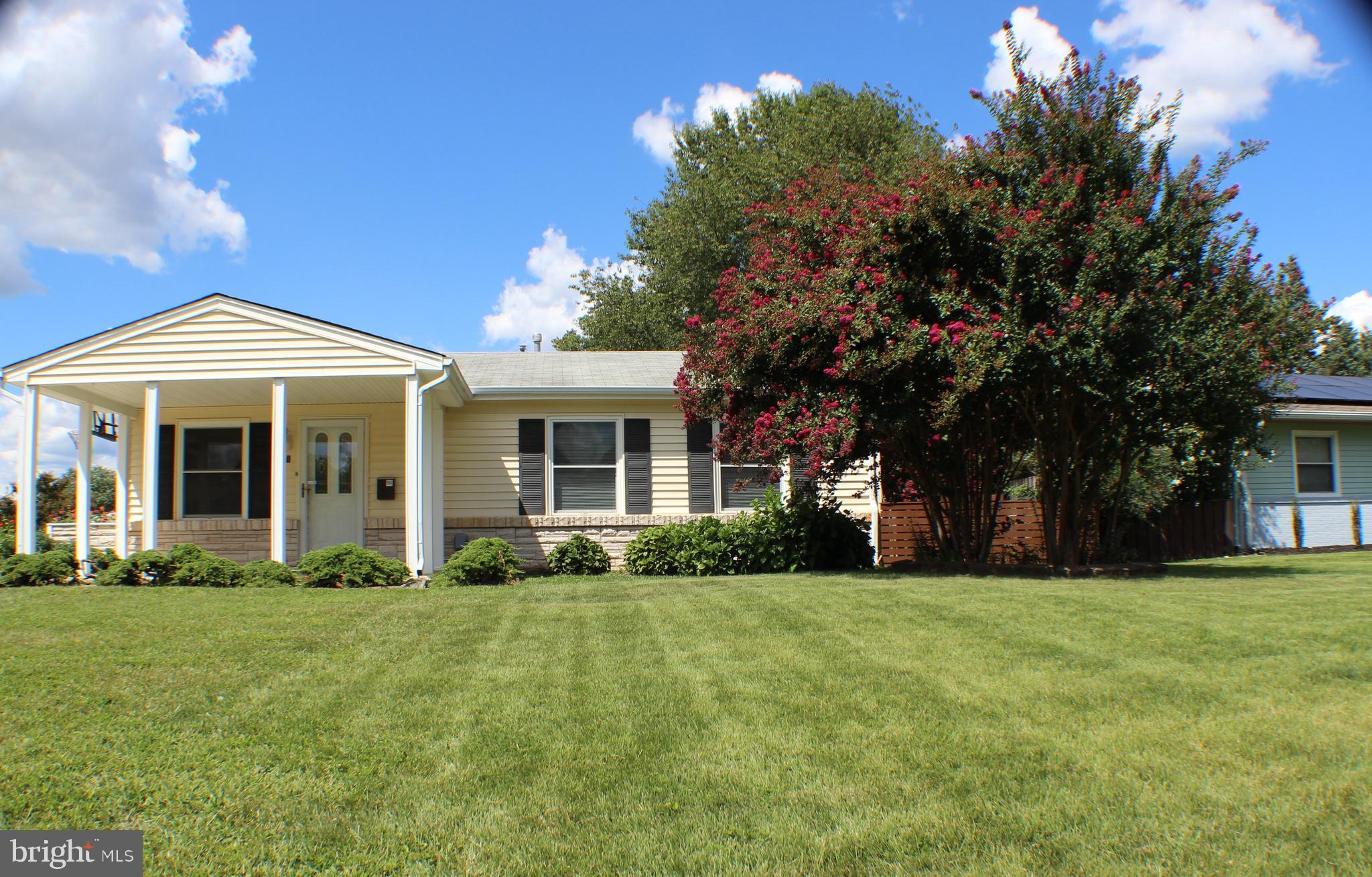 111 North Hickory Road Sterling, VA 20164 - Photo 6 of 30 a front view of a house with a yard