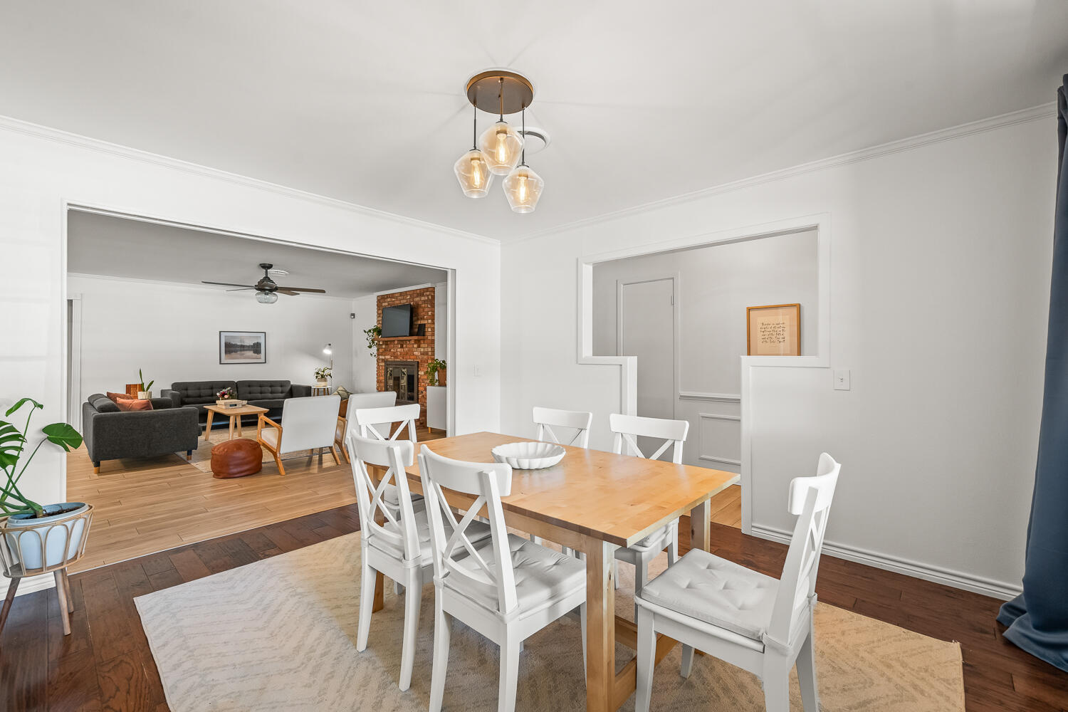 3418 62nd Street Lubbock, TX 79413 - Photo 15 of 45 a view of a dining room with furniture and wooden floor