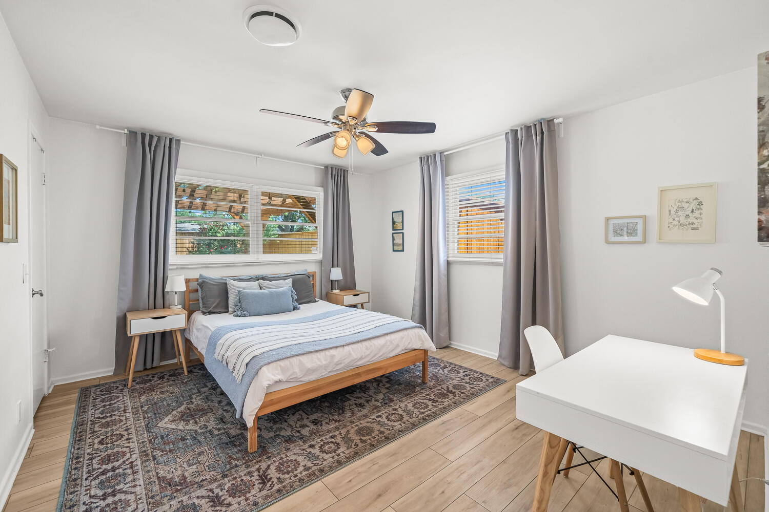 3418 62nd Street Lubbock, TX 79413 - Photo 25 of 45 a bedroom with a bed and a table