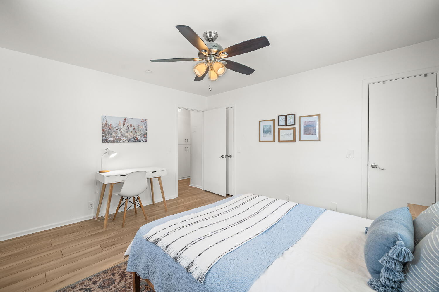 3418 62nd Street Lubbock, TX 79413 - Photo 26 of 45 a bedroom with a bed and a table