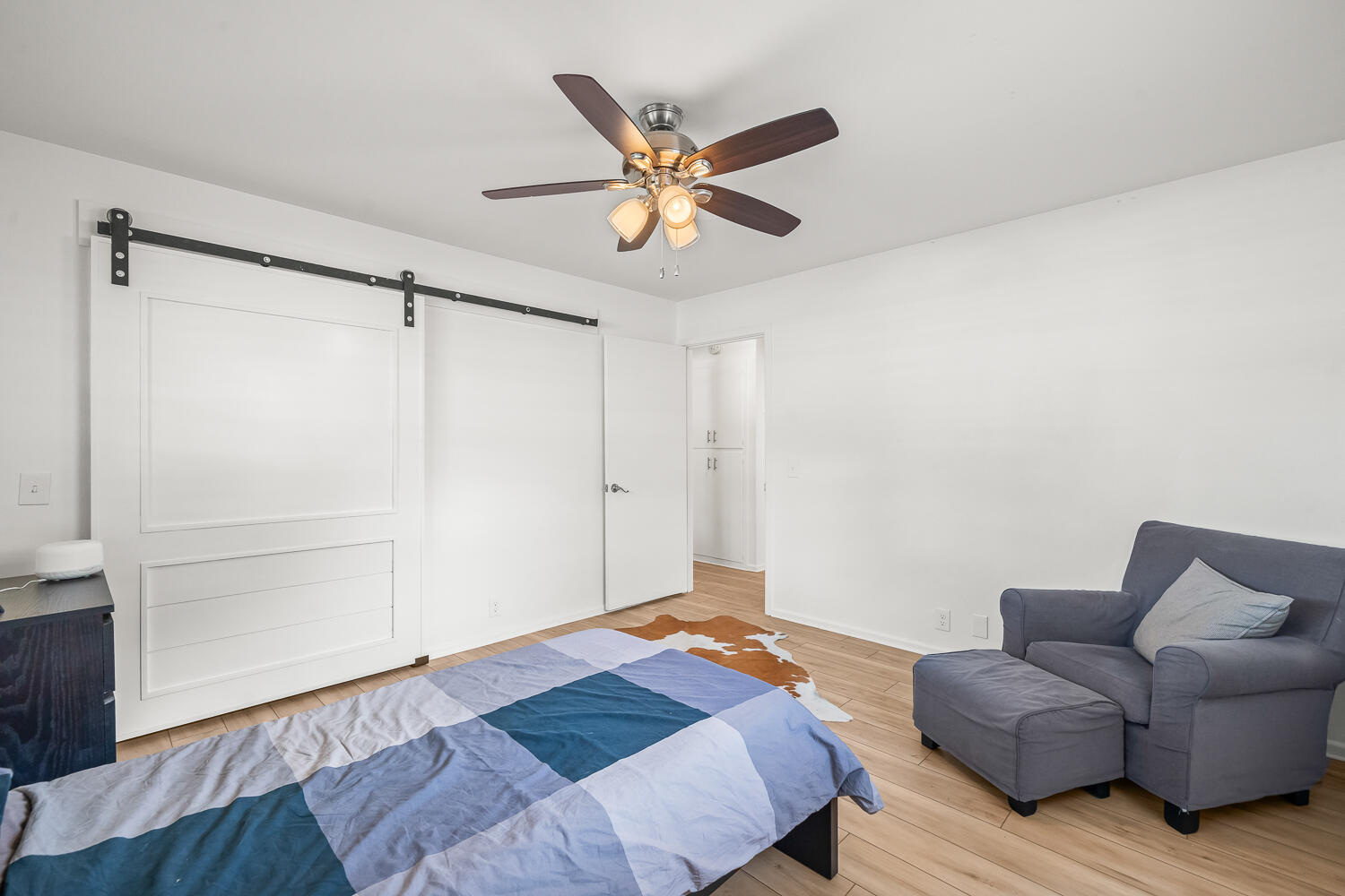 3418 62nd Street Lubbock, TX 79413 - Photo 29 of 45 a work room with furniture and a ceiling fan