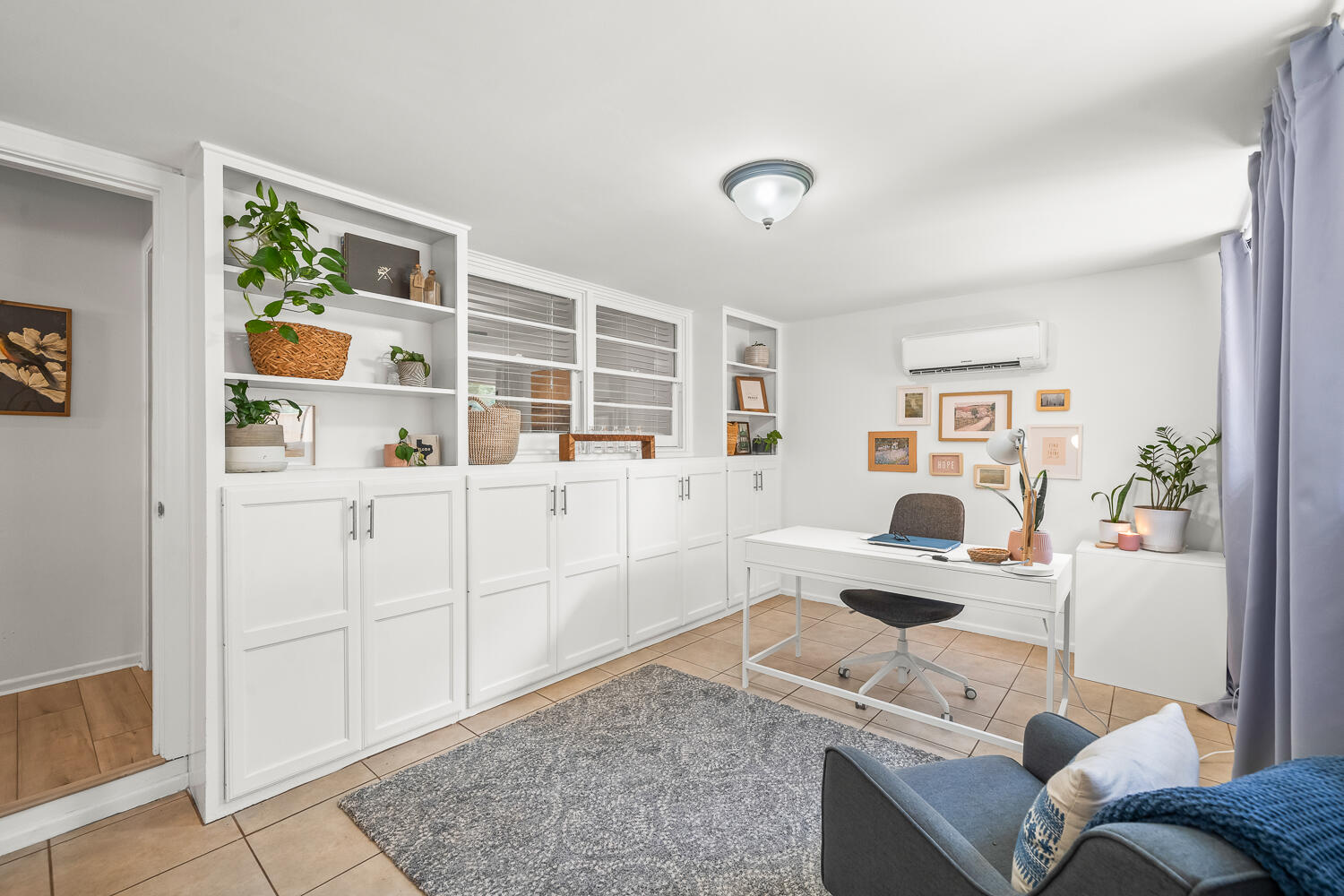 3418 62nd Street Lubbock, TX 79413 - Photo 33 of 45 a living room with furniture and a window