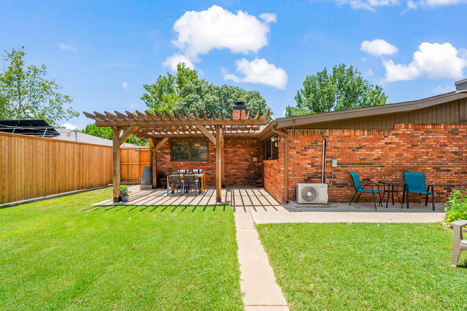 3418 62nd Street Lubbock, TX 79413 - Photo 38 of 45 a view of a swimming pool with a patio