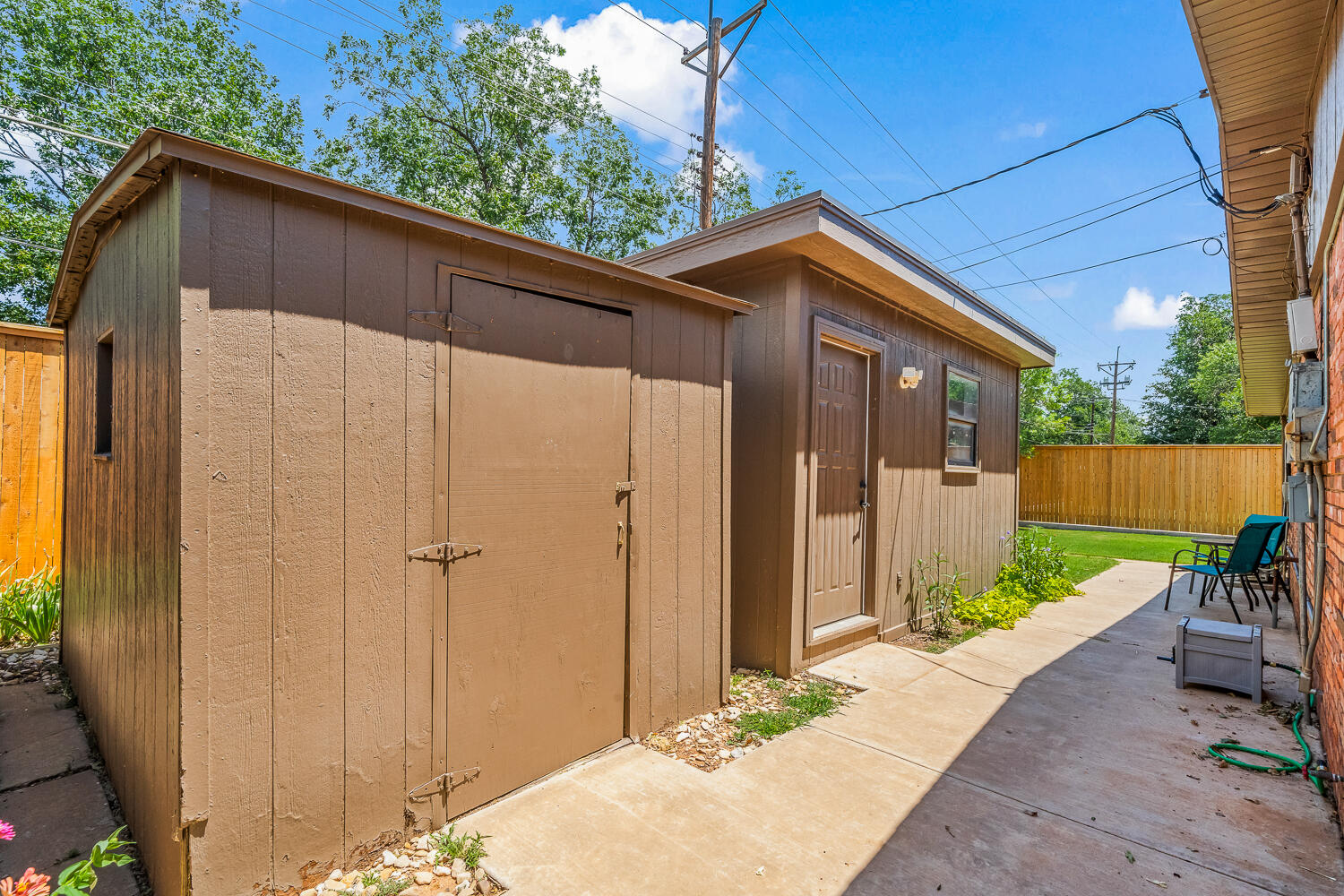 3418 62nd Street Lubbock, TX 79413 - Photo 42 of 45 a backyard of a house with seating space