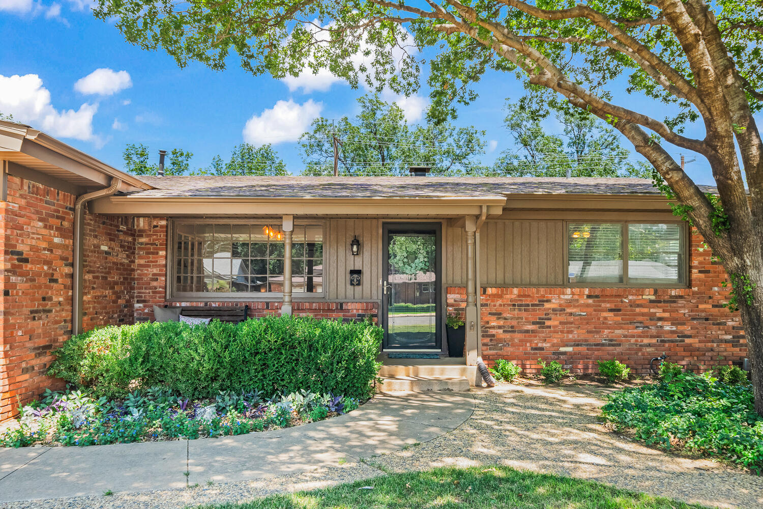 3418 62nd Street Lubbock, TX 79413 - Photo 45 of 45 front view of a house with a yard
