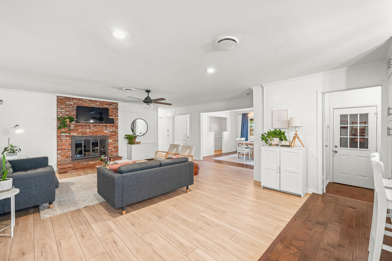 3418 62nd Street Lubbock, TX 79413 - Photo 8 of 45 a living room with furniture and a wooden floor