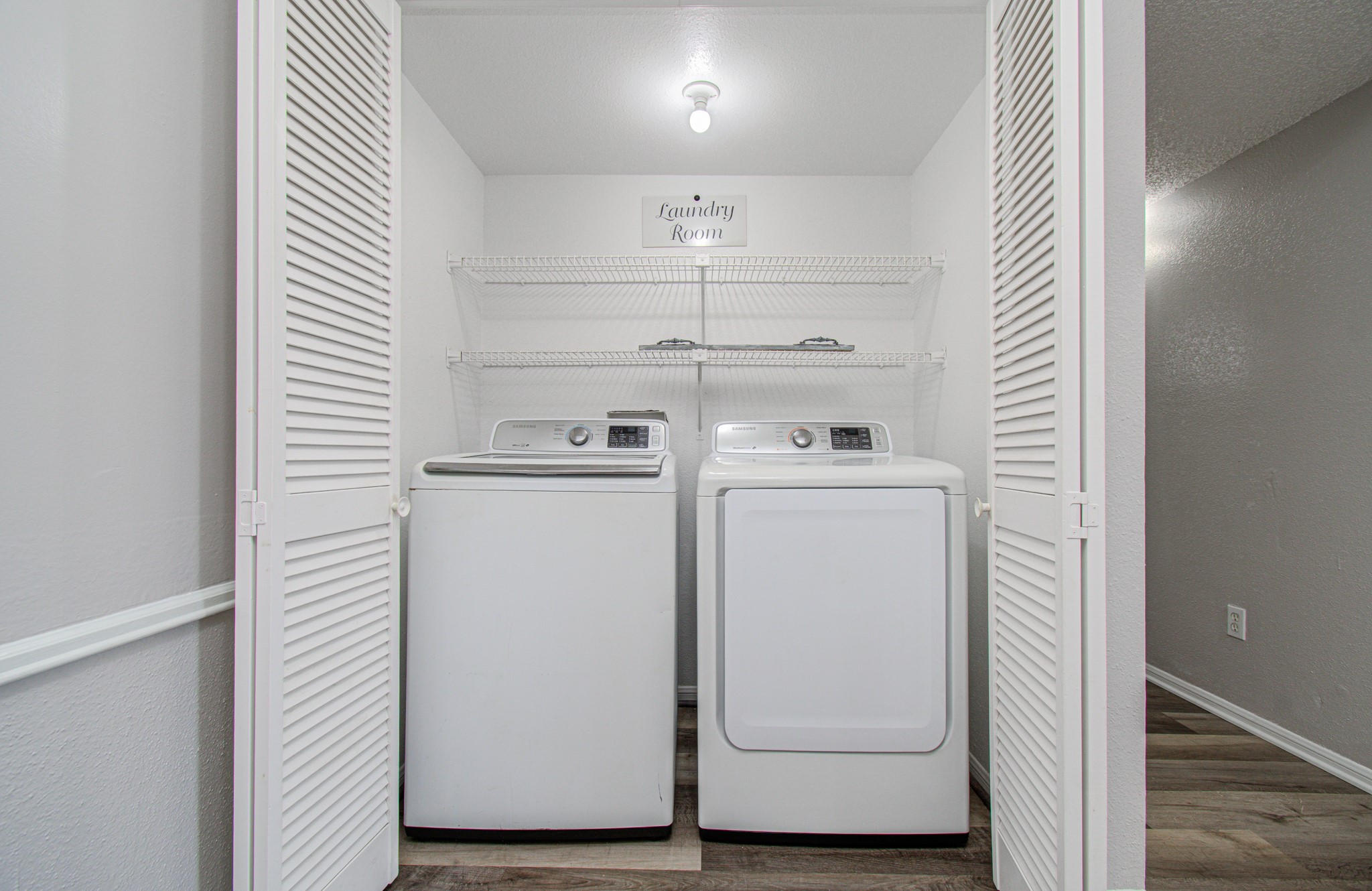 10101 South Gessner Road, Unit 405 Houston, TX 77071 - Photo 25 of 27 a utility room with closet dryer and washer