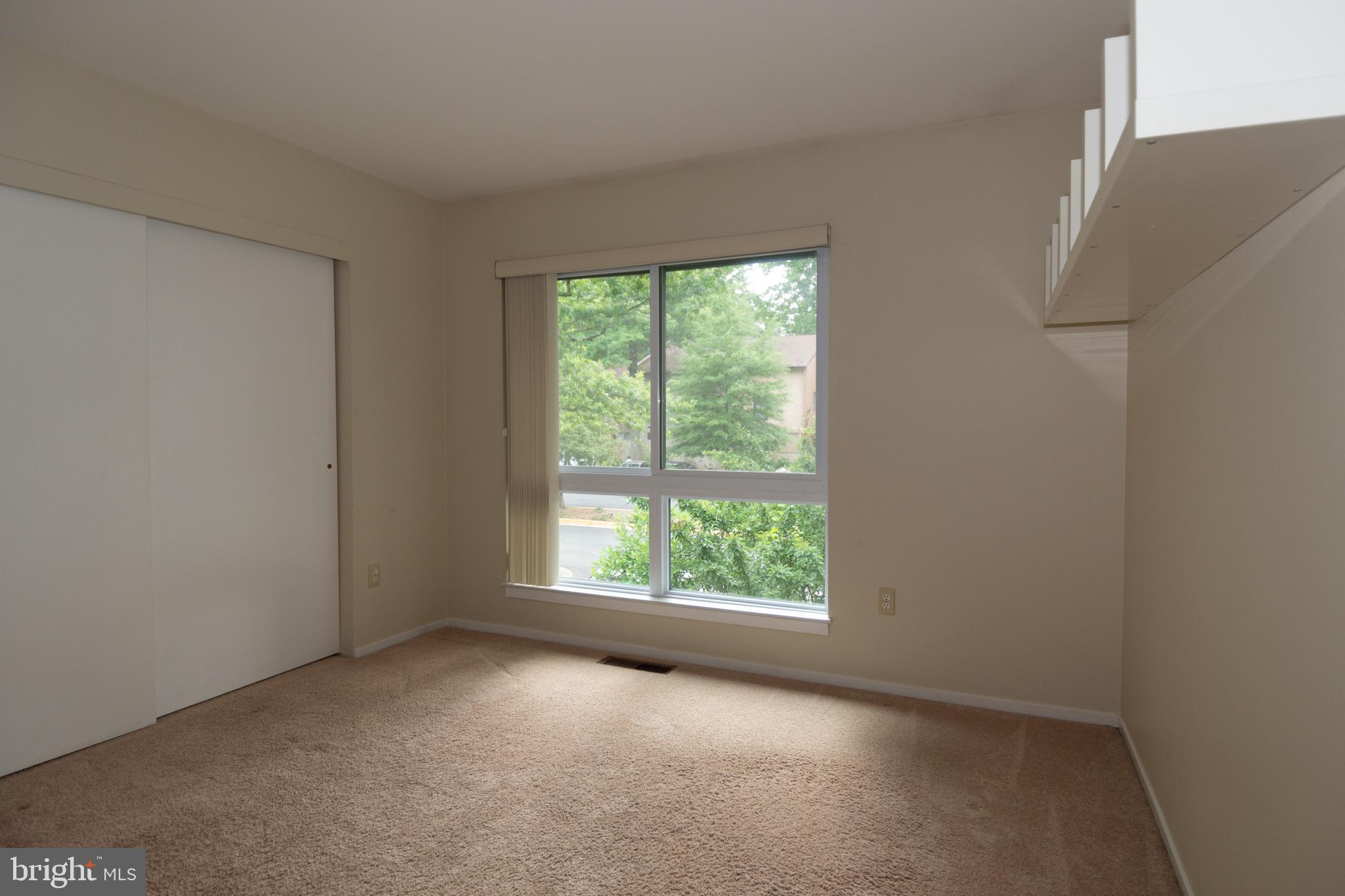 11768 Indian Ridge Road Reston, VA 20191 - Photo 15 of 57 an empty room with windows