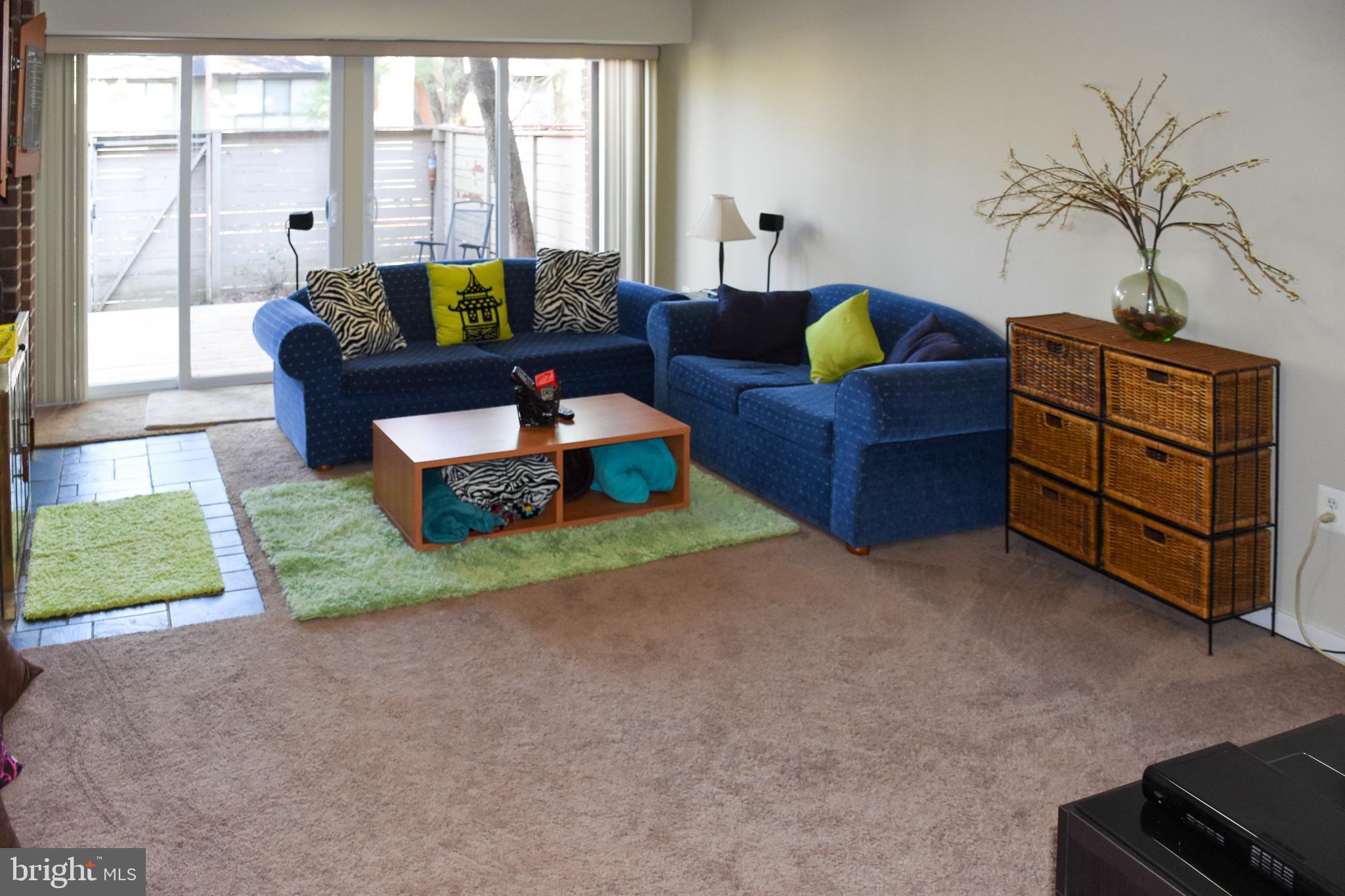 11768 Indian Ridge Road Reston, VA 20191 - Photo 19 of 57 a living room with furniture and a window