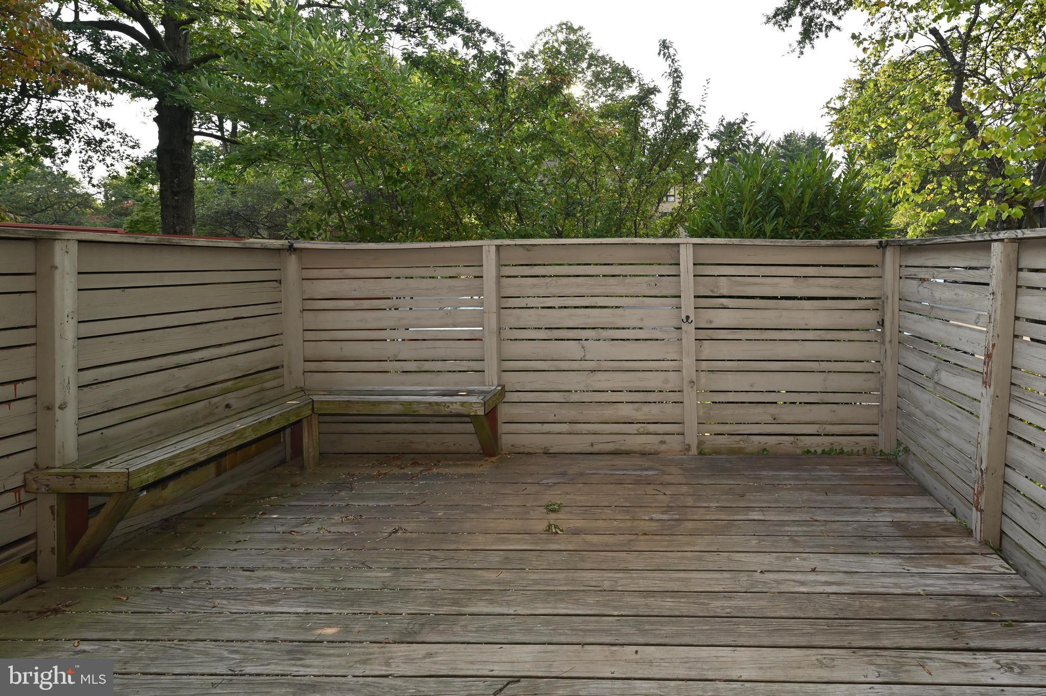 11768 Indian Ridge Road Reston, VA 20191 - Photo 32 of 57 a view of a room with a bench