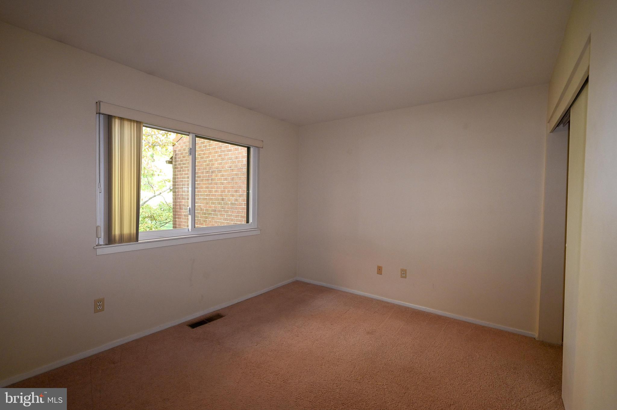 11768 Indian Ridge Road Reston, VA 20191 - Photo 41 of 57 an empty room with windows
