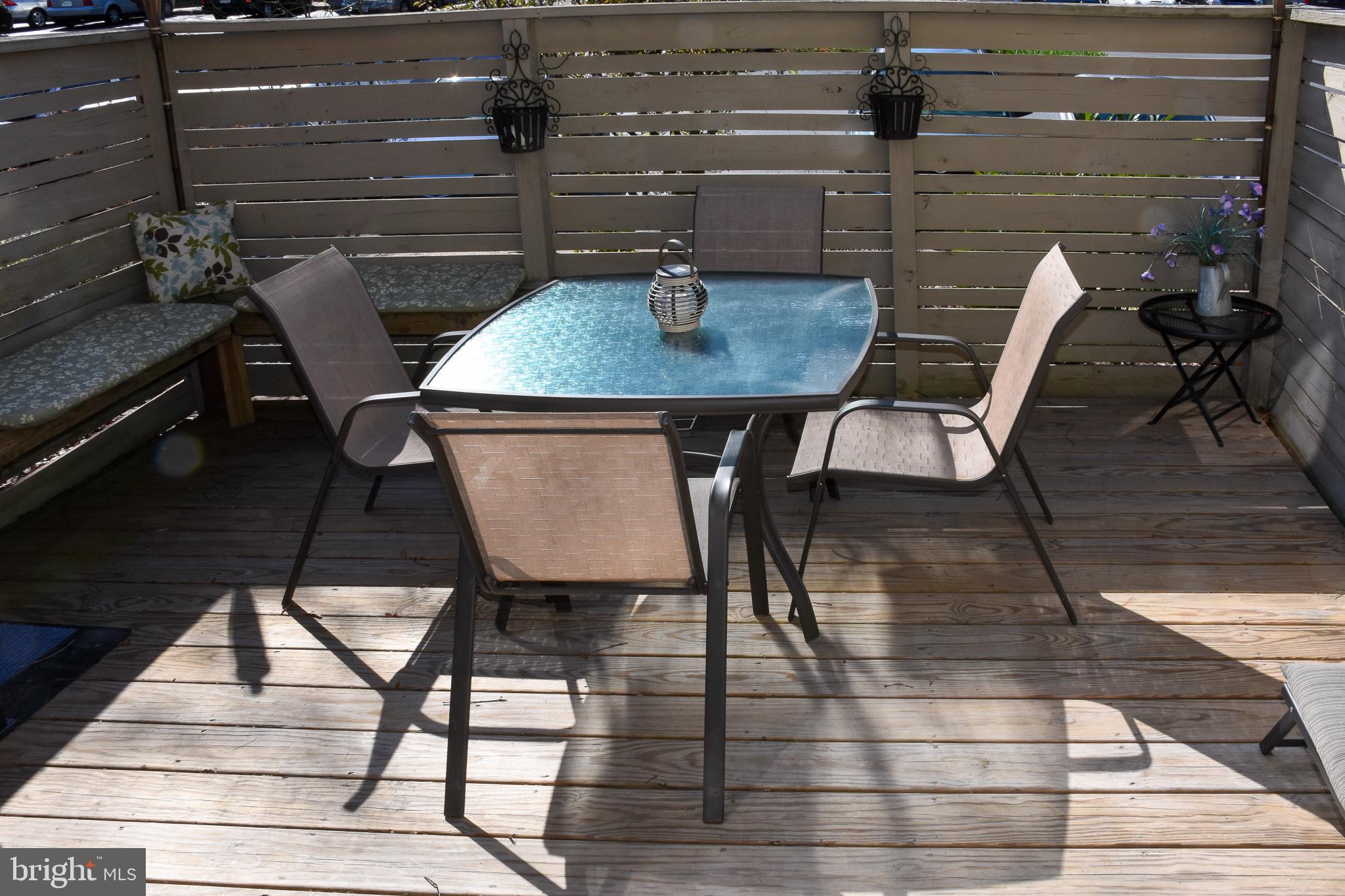 11768 Indian Ridge Road Reston, VA 20191 - Photo 5 of 57 a view of a dining room with furniture and wooden floor