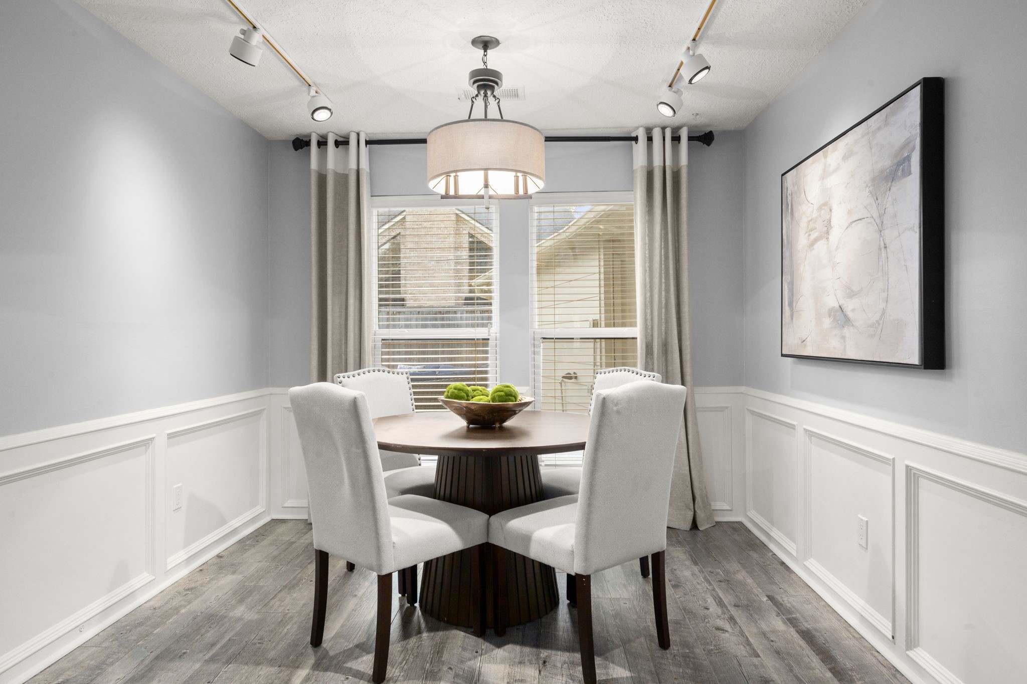 16111 Maplehurst Drive Spring, TX 77379 - Photo 8 of 30 a dining room with furniture a chandelier and wooden floor