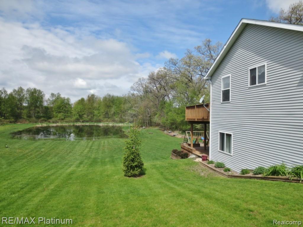 3584 County Farm Road Howell, MI 48843 - Photo 6 of 7 Backyard View of Pond