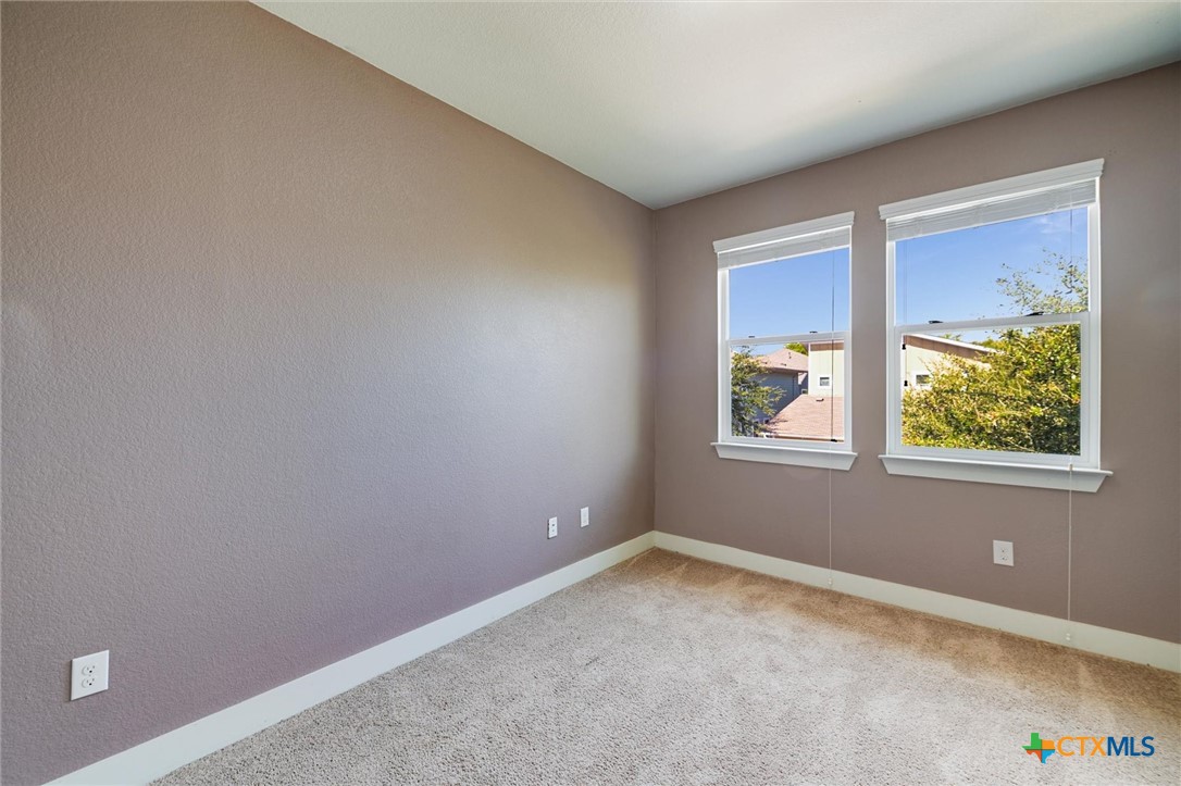 2205 Capulet Street Austin, TX 78741 - Photo 18 of 22 an empty room with windows