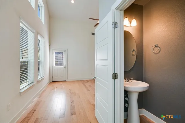 a bathroom with a sink and a mirror