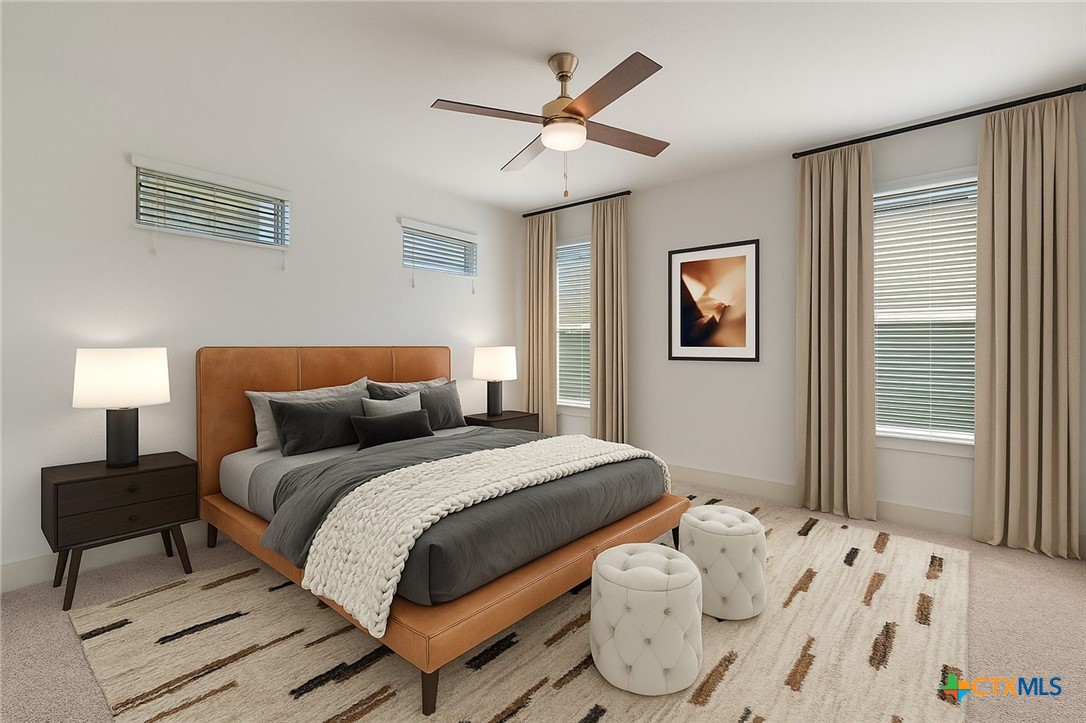 2205 Capulet Street Austin, TX 78741 - Photo 3 of 22 a bedroom with a bed and window