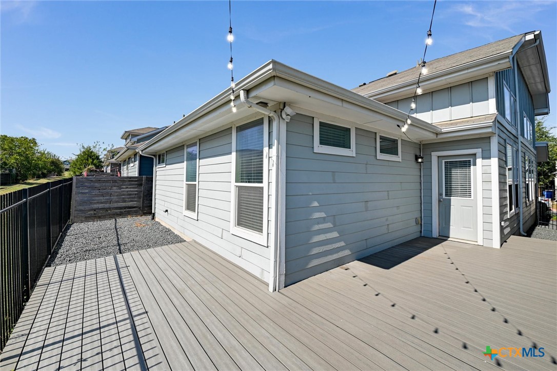 2205 Capulet Street Austin, TX 78741 - Photo 5 of 22 a view of a house with a wooden deck