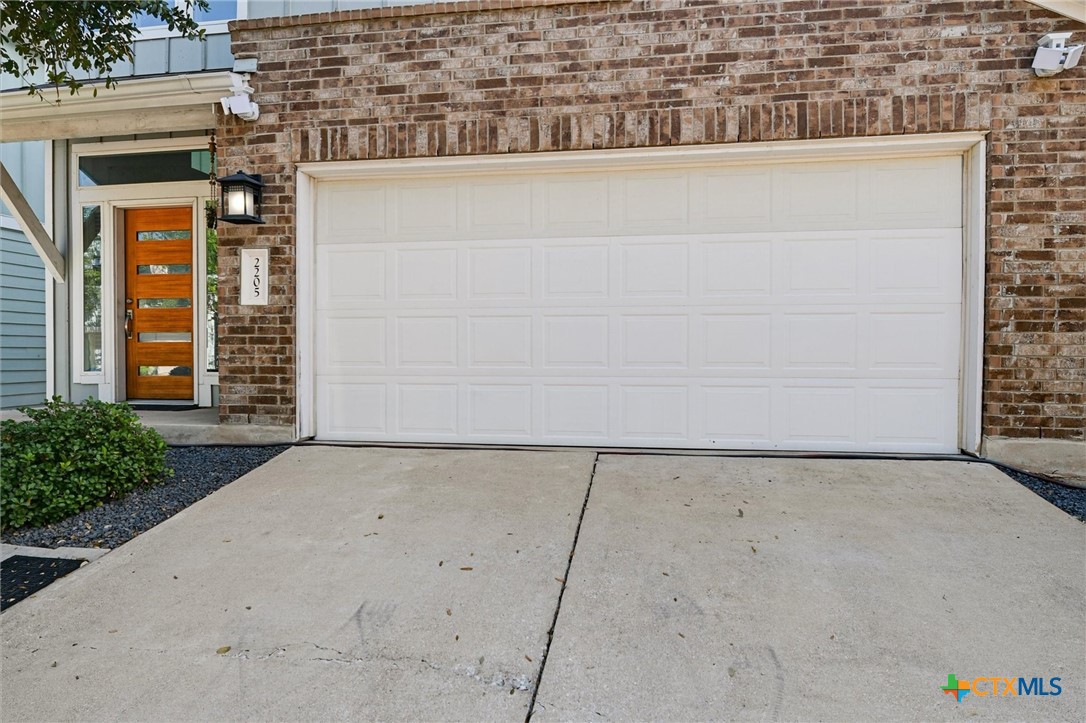 2205 Capulet Street Austin, TX 78741 - Photo 8 of 22 a view of a brick house with a street